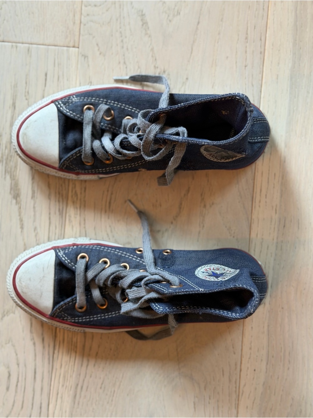 Converse Distressed Navy Blue High-Top Sneakers with White Toe Cap